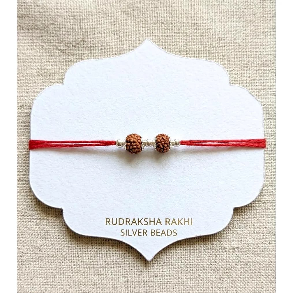 Braided Thread Rakhi with Silver Coin