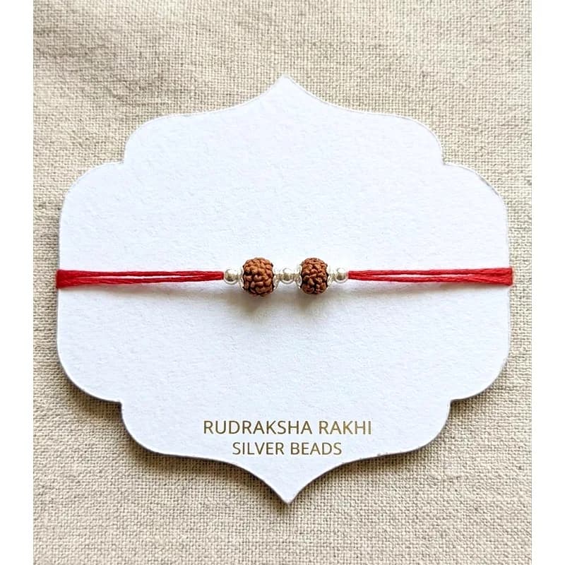 Braided Thread Rakhi with Silver Coin